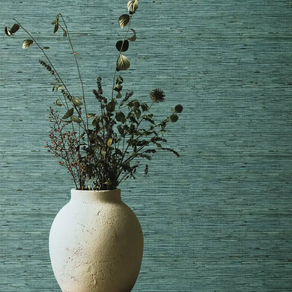 Interior with Blue Grey Oceanside Grass wallpaper by York Wallcoverings, adding serene texture to the room.