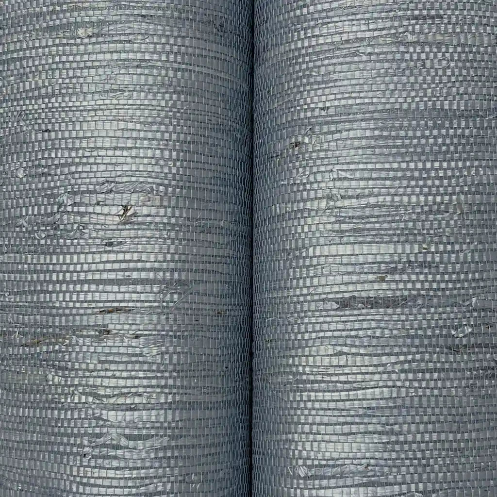 Close-up texture of York Wallcoverings' Oceanside Grass wallpaper in Blue Grey, highlighting its natural woven look.