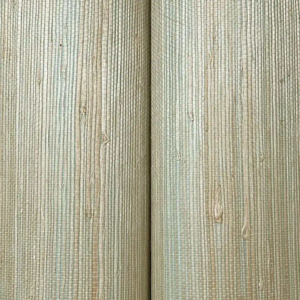 Close-up texture of York Wallcoverings "Oceanside Grass" wallpaper in seafoam and tan, highlighting its natural woven detail.