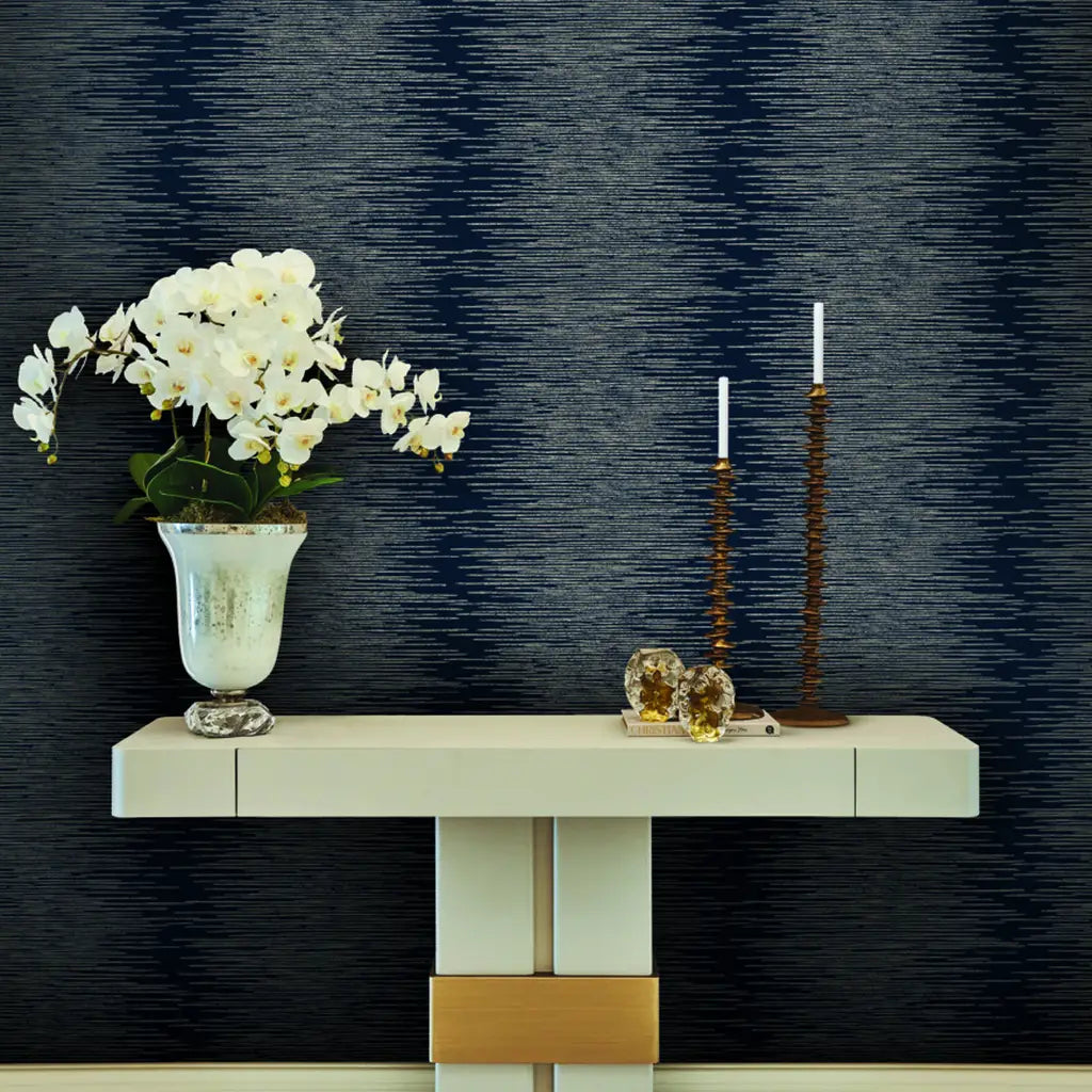 Elegant entryway featuring Operetta wallpaper by York Wallcoverings in a sophisticated Navy Blue and Taupe pattern.