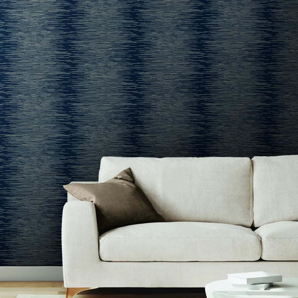 Luxurious living room showcases Operetta wallpaper in Navy Blue & Taupe by York Wallcoverings, adding elegant style.