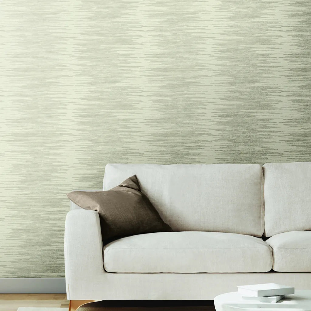 Warm Ivory 'Operetta' wallpaper by York Wallcoverings enhances this elegant living room with its classic pattern.