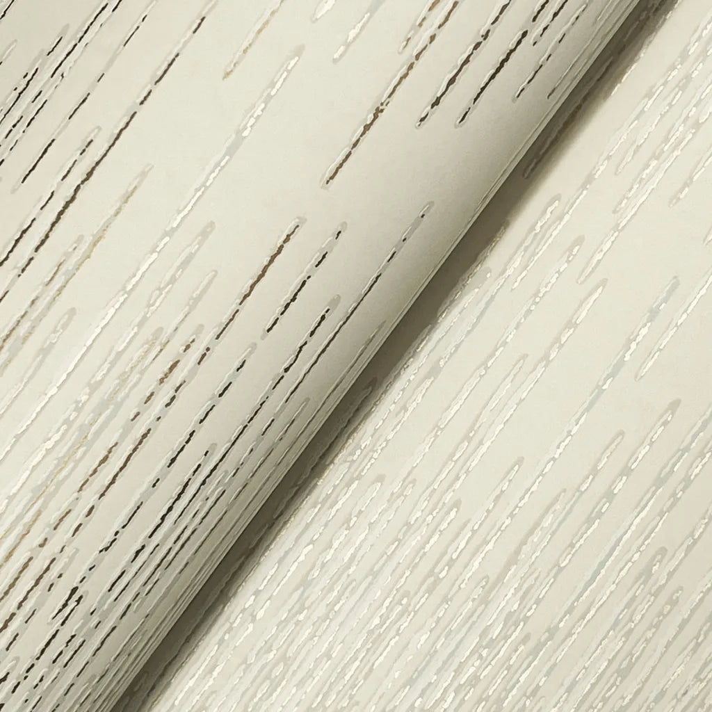 Close-up texture detail of York Wallcoverings' Operetta wallpaper in elegant Warm Ivory, highlighting its subtle pattern.