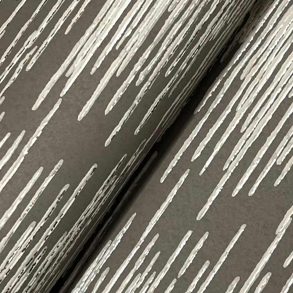 Close-up texture detail of Operetta wallpaper in Taupe by York Wallcoverings, showcasing its intricate pattern.