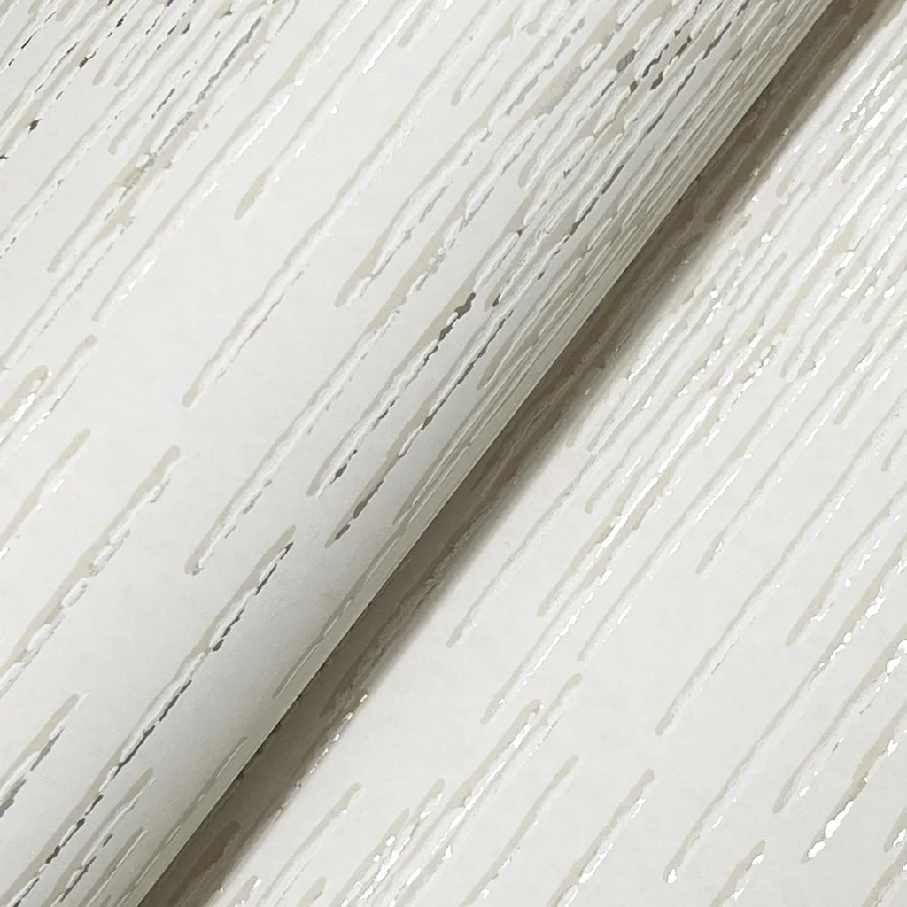 Close-up of Operetta wallpaper in Warm Ivory by York Wallcoverings, showcasing its elegant, subtle texture.