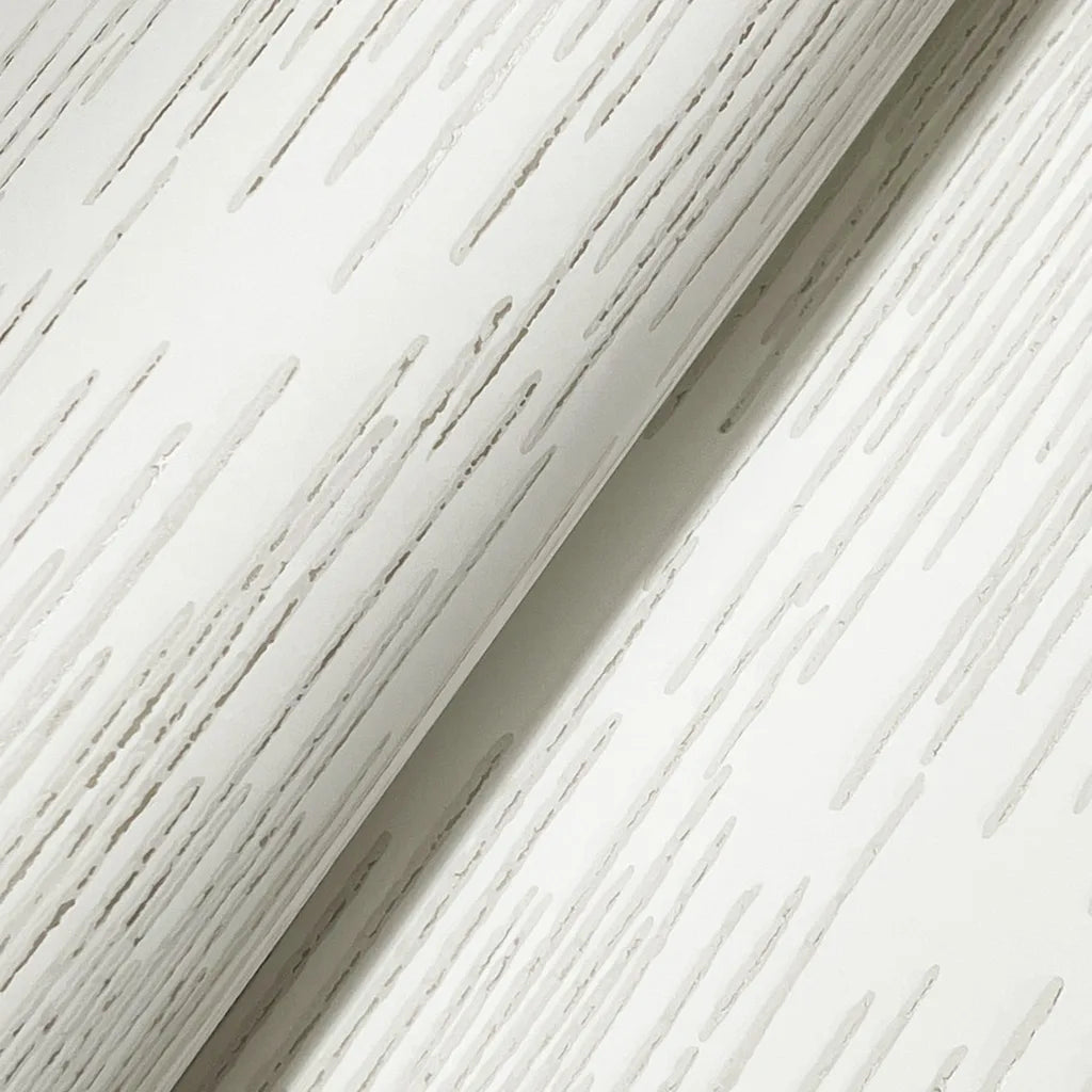 Close-up texture of York Wallcoverings Operetta wallpaper in Warm Ivory, showcasing its intricate detail and subtle elegance.