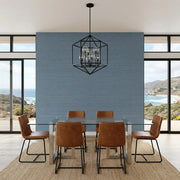 Dining Room - Serene dining room featuring York Wallcoverings' Dusty Blue Painted Hemp textured wallpaper for a calming feel.