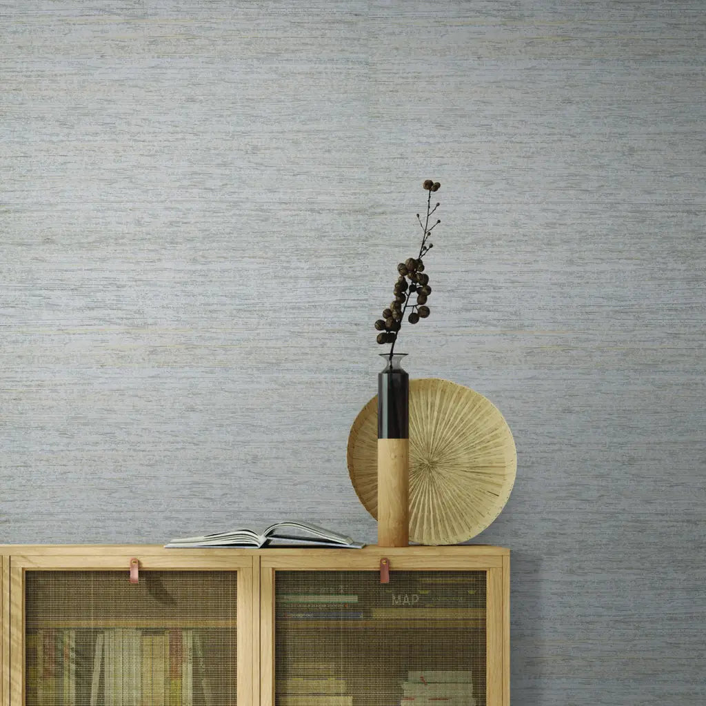 Elegant living room design highlights York Wallcoverings' "Painted Hemp" wallpaper in Light Greige, offering subtle texture.