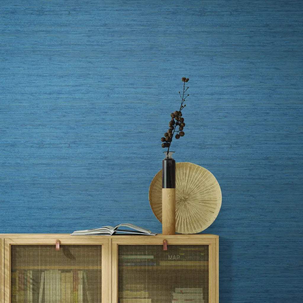 Living room showcasing Dusty Blue Painted Hemp wallpaper by York Wallcoverings, adding serene texture and color.