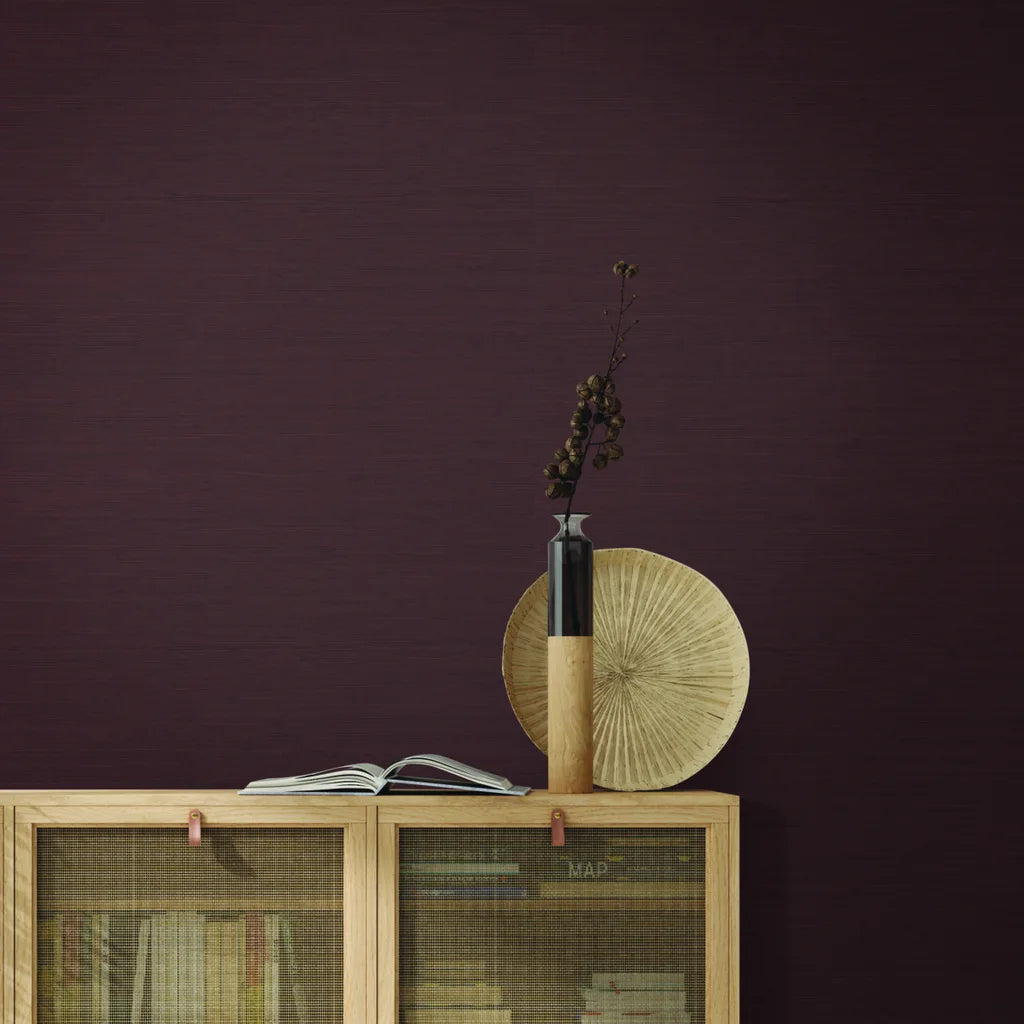 Living room with stunning Mahogany "Painted Hemp" wallpaper by York Wallcoverings, adding texture & warmth to the space.