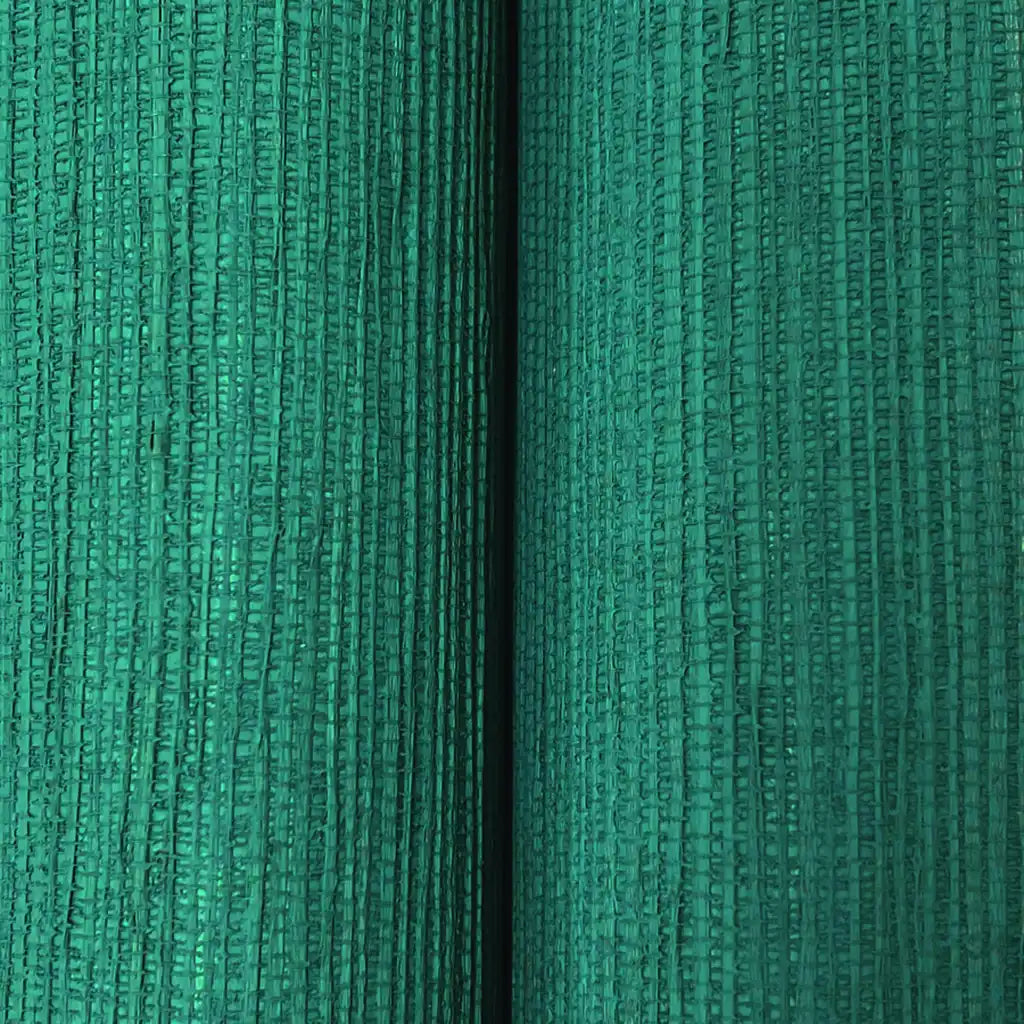 Close-up texture of Painted Hemp wallpaper in teal from York Wallcoverings.