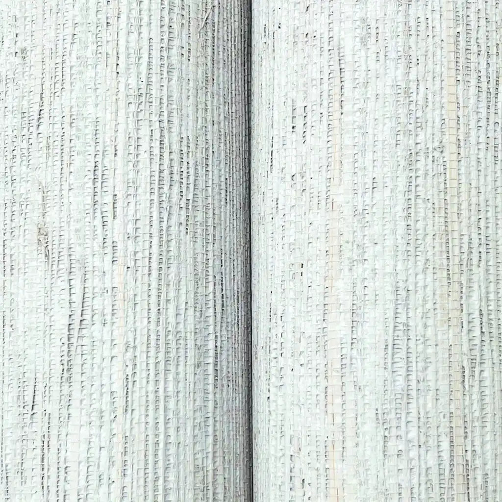 Close-up texture detail of York Wallcoverings' Pale Beige "Painted Hemp" wallpaper, highlighting its natural fibers.