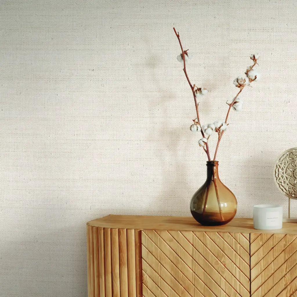 Living room with elegant Painted Raffia wallpaper in Warm Ivory by York Wallcoverings, creating a serene and inviting space.