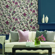 Living room featuring elegant "Parterre" wallpaper in Cream, Pink, Green by York Wallcoverings, creating a beautiful, inviting space.