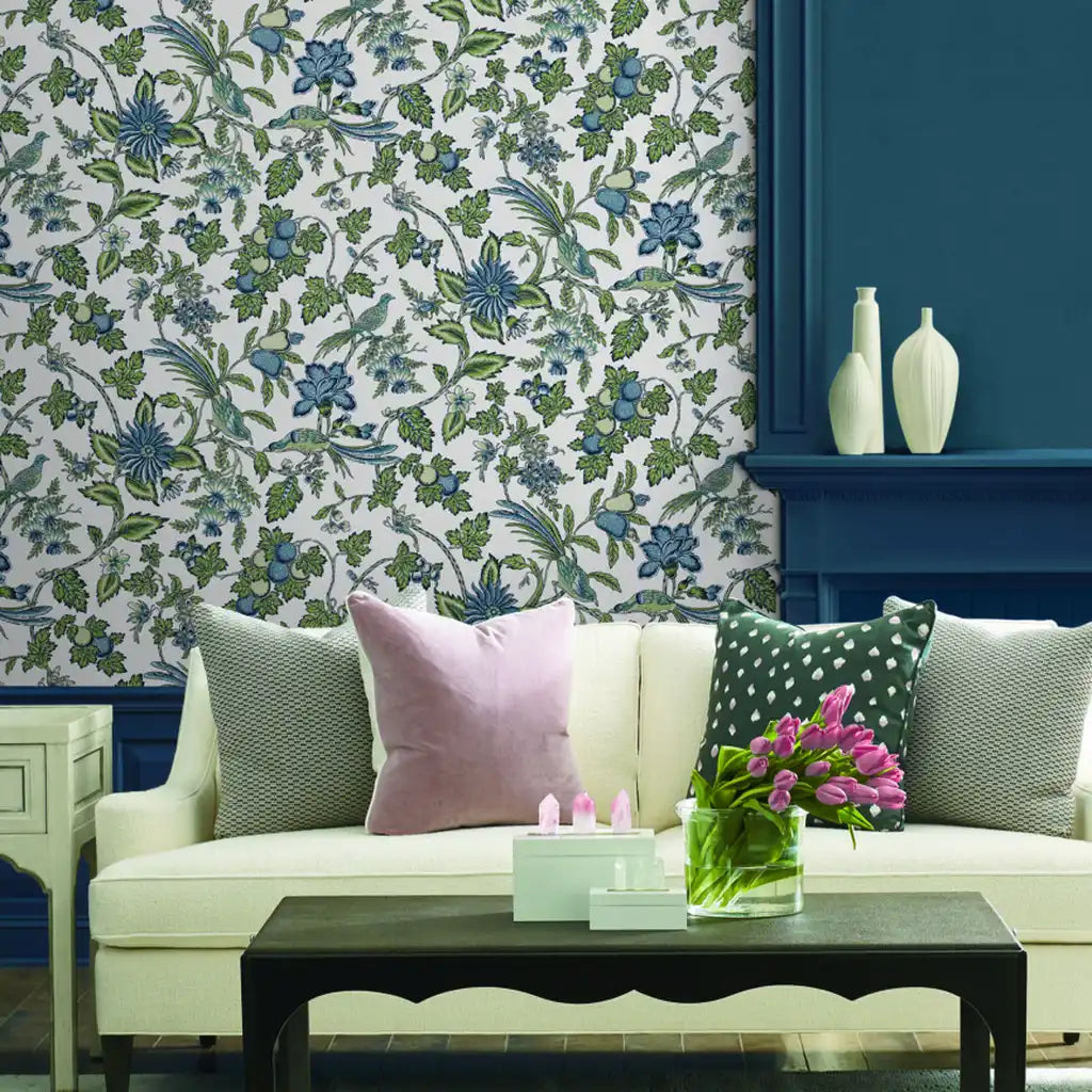Elegant living room showcases 'Parterre' wallpaper in Blue, Green, White by York Wallcoverings, creating a vibrant and sophisticated interior.