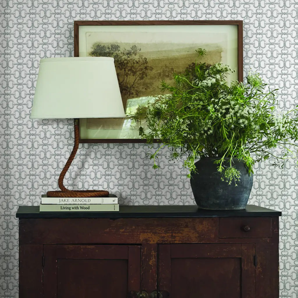 Modern living room showcasing elegant Polo wallpaper in Light Grey by York Wallcoverings, creating a sophisticated ambiance.