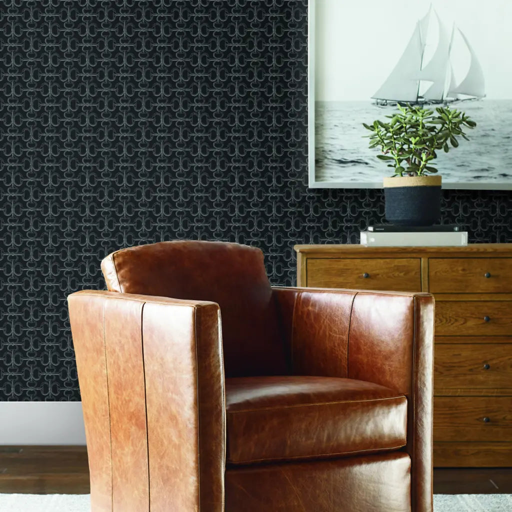 Modern living room showcasing elegant 'Polo' wallpaper in Charcoal and Grey by York Wallcoverings, enhancing sophisticated interior design.