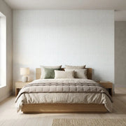 Bedroom - Serene space features Priti wallpaper in a beautiful blue and white design by York Wallcoverings.