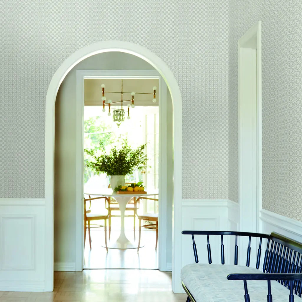 Grey and White Priti wallpaper by York Wallcoverings adds sophisticated style to this welcoming entryway.