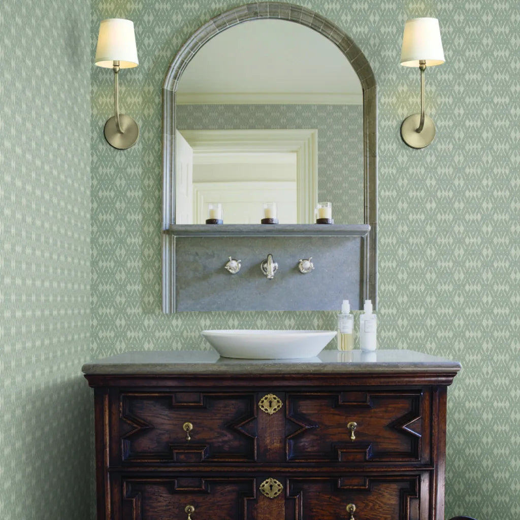 Elegant bathroom features Radcliffe wallpaper in Greige by York Wallcoverings, creating a sophisticated and calming space.
