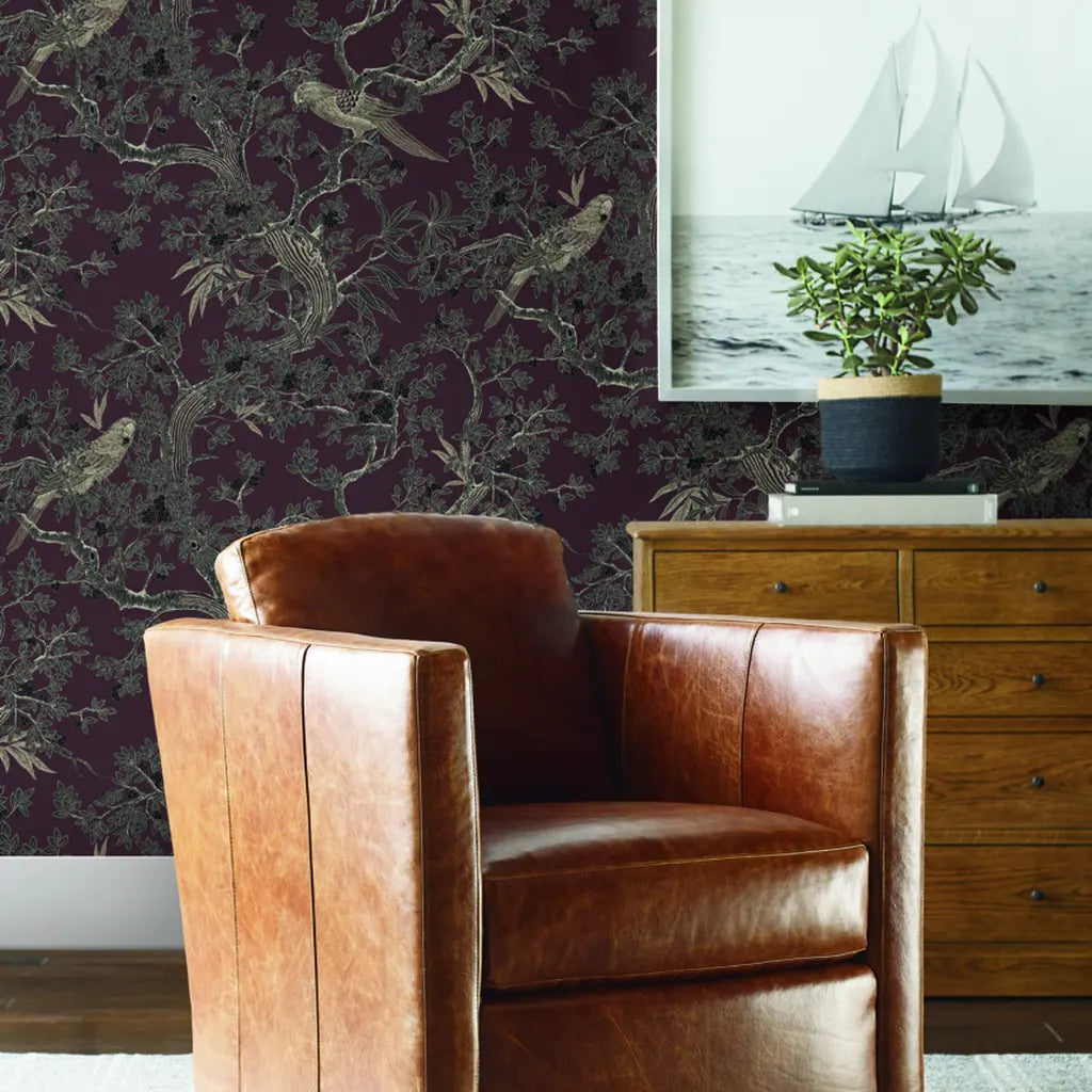 Luxurious living room features Regal Ridge wallpaper in Burgundy by York Wallcoverings, creating an elegant and inviting space.