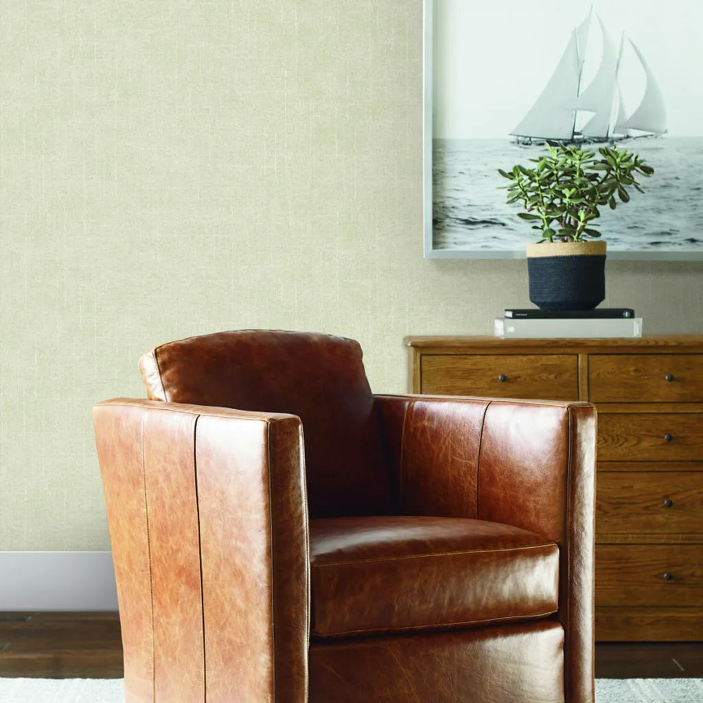 Living room featuring elegant Saratoga wallpaper in Warm Ivory by York Wallcoverings, creating a serene and inviting space.