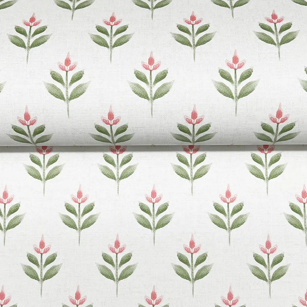 Close-up Serene Villa wallpaper texture by York Wallcoverings, revealing its soft green, pink & white design details.