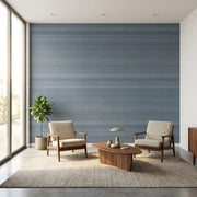 Living Room - Serene living space showcasing "Silk Road" wallpaper in Dusty Blue by York Wallcoverings for a tranquil, stylish design.