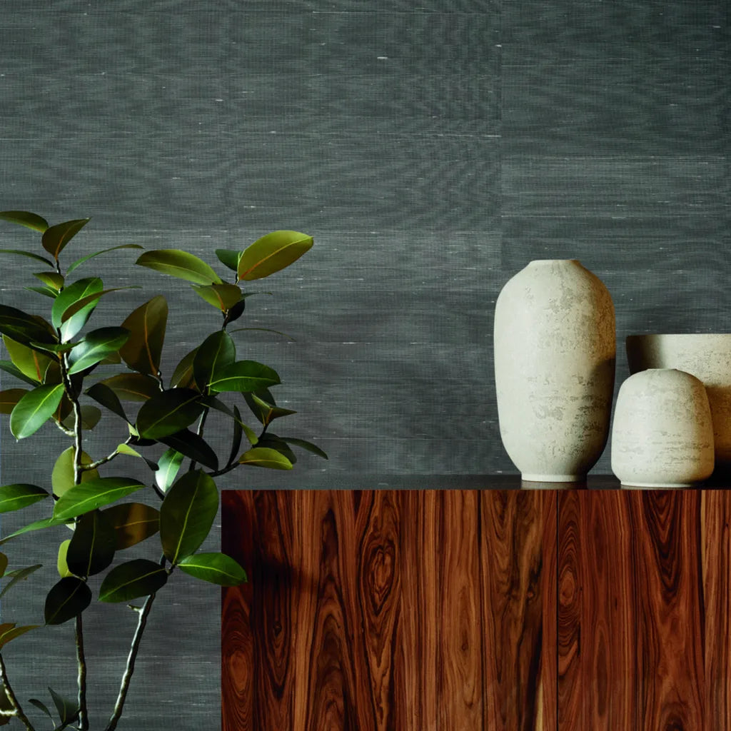 Modern living room showcasing sophisticated Silk Road wallpaper in Charcoal by York Wallcoverings, enhancing the stylish decor.
