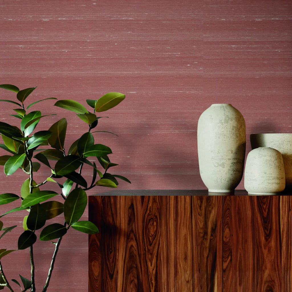 Living room featuring "Silk Road" wallpaper in Terracotta by York Wallcoverings, creating a warm, globally-inspired space.