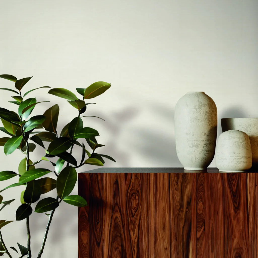 Living room with elegant York Wallcoverings "Silk Road" wallpaper in Warm Ivory, creating a serene and inviting space.