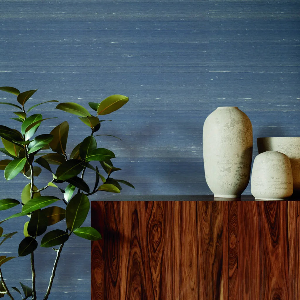 "Silk Road" Dusty Blue wallpaper by York Wallcoverings adds elegant texture to a modern interior design.
