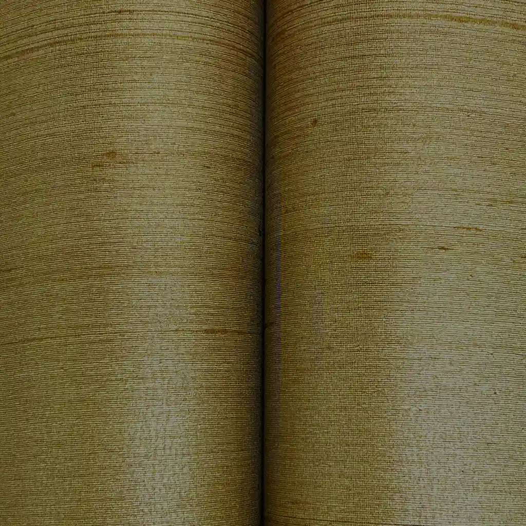 Detailed close-up of York Wallcoverings' Silk Road wallpaper in Warm Taupe, showcasing its rich, woven texture.