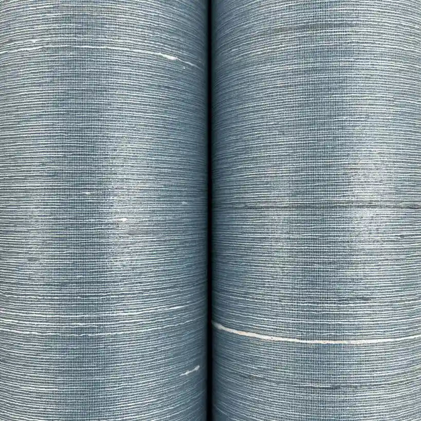 Close-up texture of "Silk Road" wallpaper in Dusty Blue by York Wallcoverings, highlighting its intricate detail.