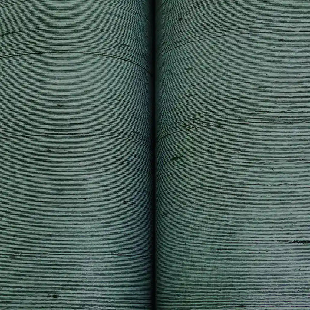 Close-up texture detail of York Wallcoverings' Charcoal "Silk Road" wallpaper, highlighting its elegant woven pattern.