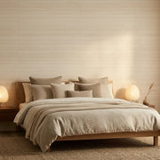 Bedroom - Natural Beige Smooth Abaca wallpaper by York Wallcoverings adds organic texture and warmth to this stylish bedroom.