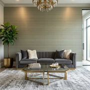 Living Room - features York Wallcoverings' Smooth Abaca wallpaper in Olive Green, creating a serene and natural ambiance.