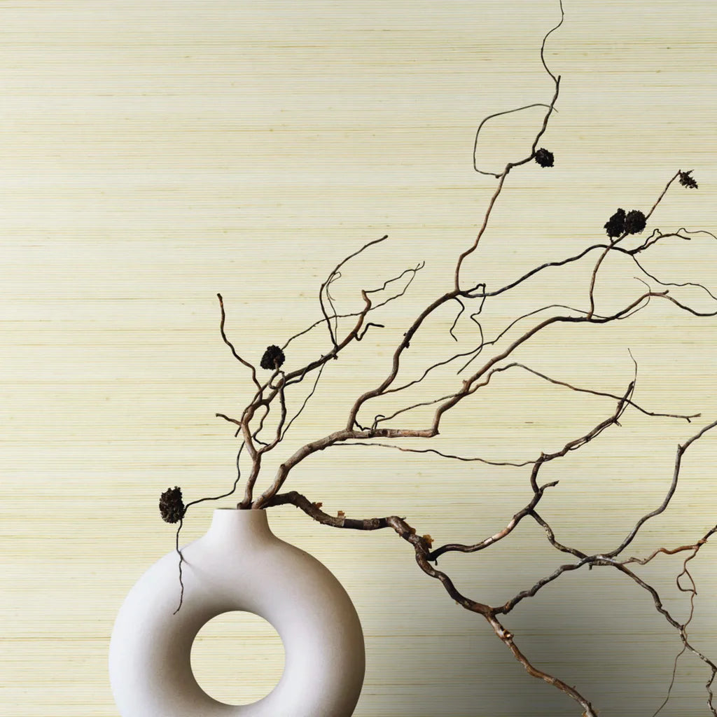 Smooth Abaca wallpaper in Natural Beige by York Wallcoverings adds organic texture to this elegant interior.