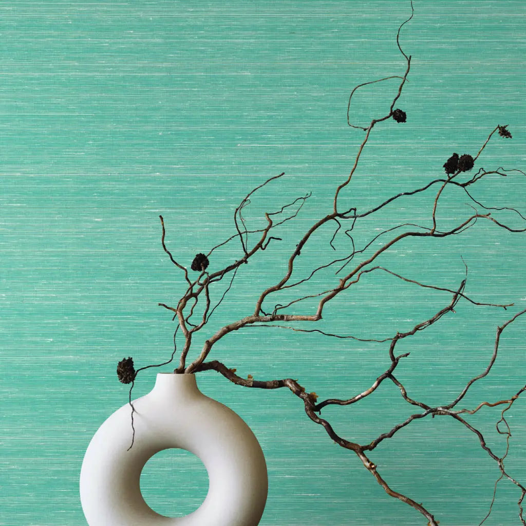 Smooth Abaca light teal wallpaper by York Wallcoverings adds serene texture to this modern interior.