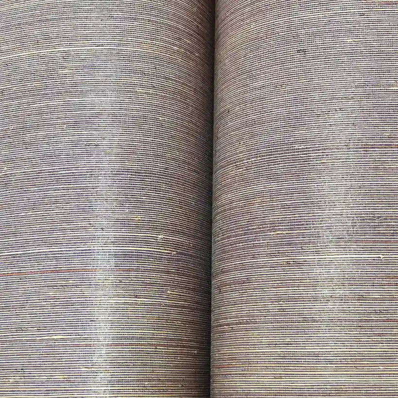 Close-up texture of Smooth Abaca wallpaper in Mauve Taupe by York Wallcoverings, highlighting its subtle woven pattern.