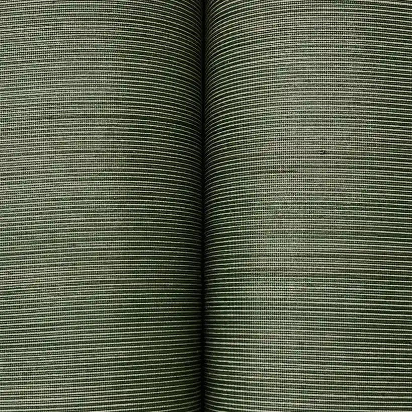 Close-up texture detail of York Wallcoverings' Dark Green Smooth Abaca wallpaper, showcasing its natural fibers.