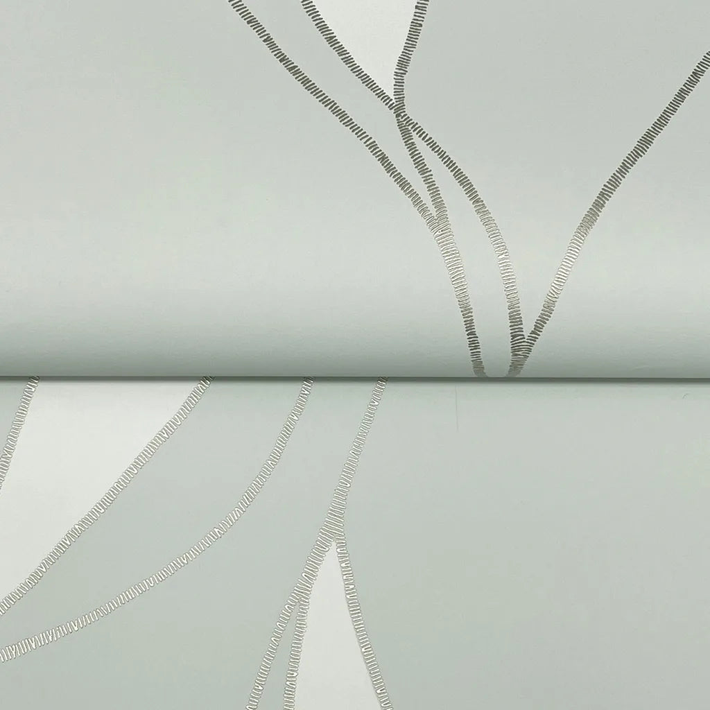 Close-up texture of York Wallcoverings' elegant "Society Hill" wallpaper in soft Pale Celadon, revealing its intricate pattern.