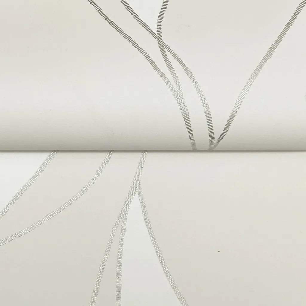 Close-up texture detail of Society Hill wallpaper in Warm Ivory by York Wallcoverings, highlighting its subtle pattern.