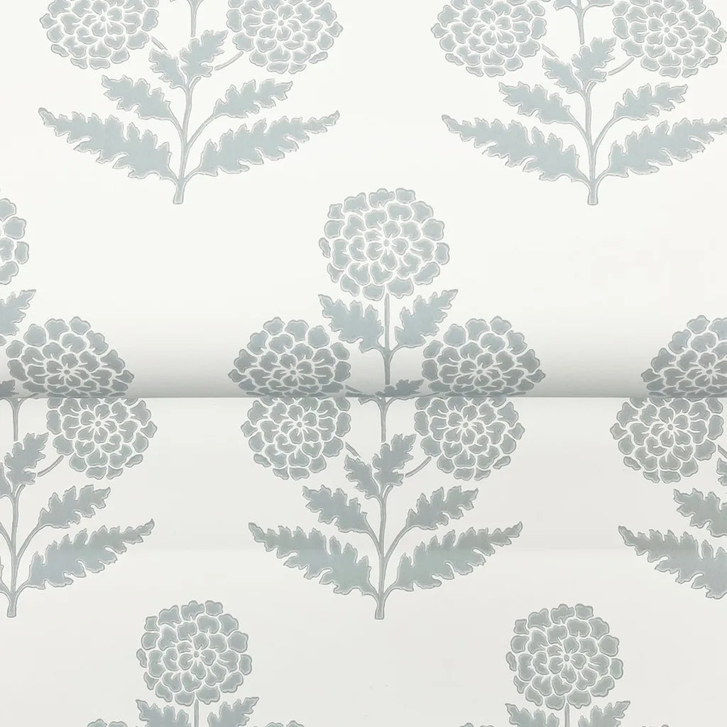 Close-up of 'Souci' wallpaper by York Wallcoverings, showcasing its intricate grey and white textural pattern.