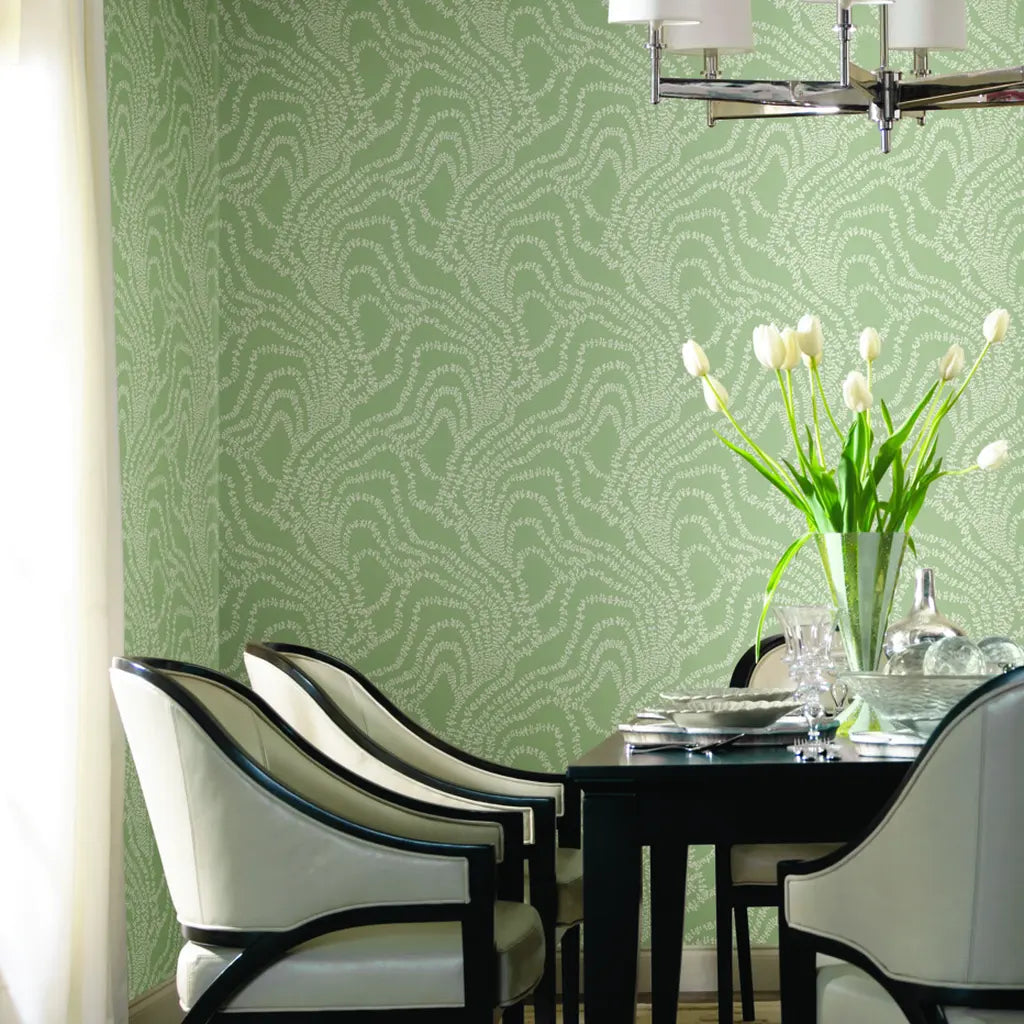 Elegant dining room featuring String of Pearls wallpaper in Sage Green by York Wallcoverings, creating a serene and stylish space.