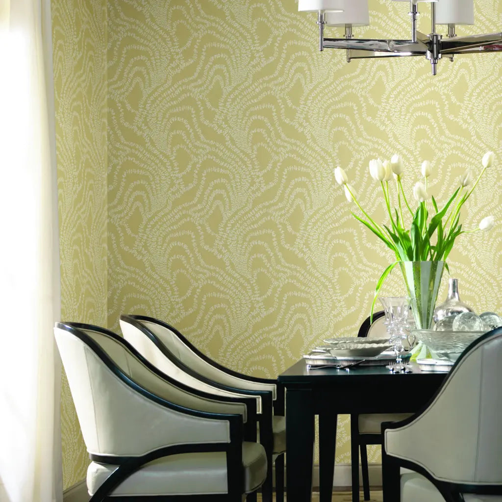 Elegant dining room showcasing Warm Beige String of Pearls wallpaper by York Wallcoverings, adding sophisticated texture.