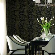 Dining room showcasing elegant "String of Pearls" wallpaper in black and gold by York Wallcoverings.