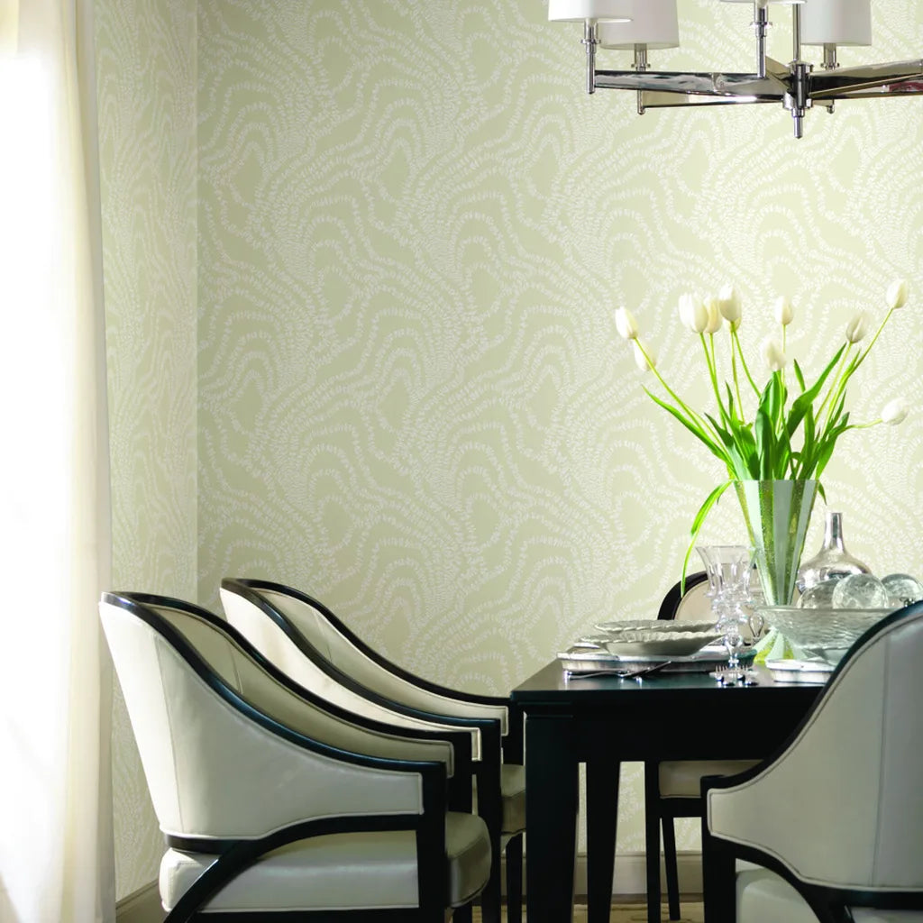 Dining room featuring elegant "String of Pearls" wallpaper in Warm Ivory by York Wallcoverings, creating a sophisticated ambiance.