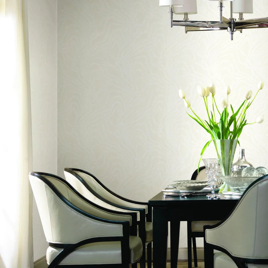 Dining room showcasing elegant String of Pearls wallpaper in Warm Ivory by York Wallcoverings, creating a sophisticated ambiance.