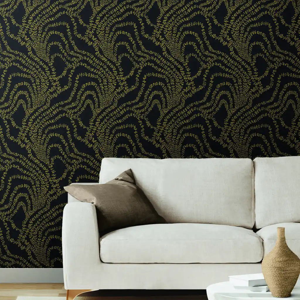 Luxurious living room showcases String of Pearls wallpaper by York Wallcoverings in stunning black and gold.
